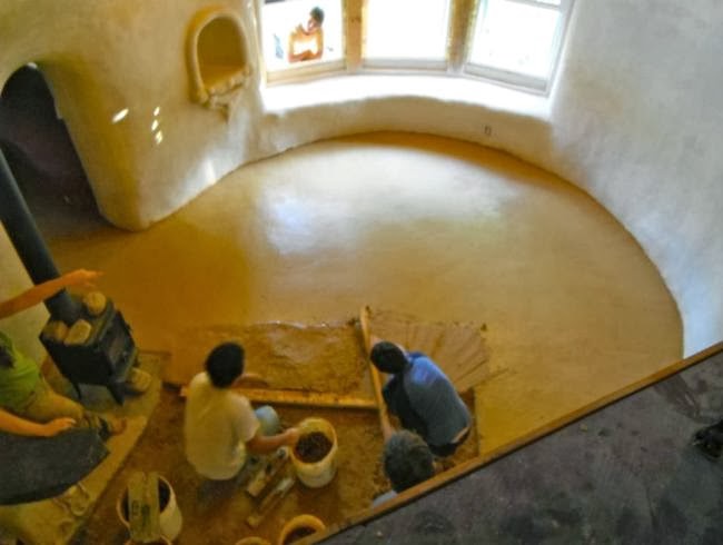 Laying an adobe earthen floor