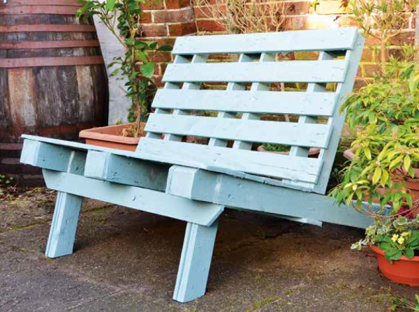 A bench made from pallets features in the Permaculture Book of DIY